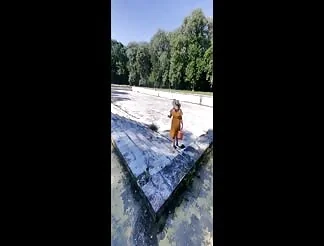 Slut sucks in an abandoned pool