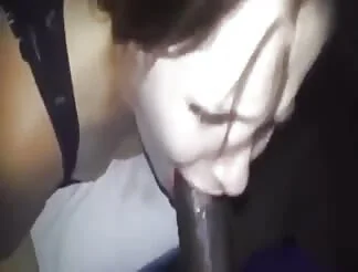 Lusty chick gags on a big black dick