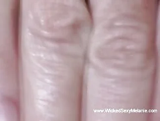 A mature blonde plays with her pussy and sucks a dick