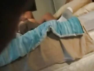 A hot brunette gets warm sperm on her face and tits