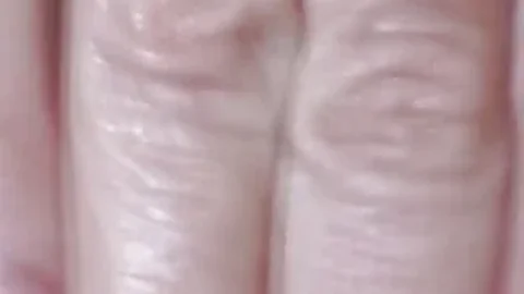 A mature blonde plays with her pussy and sucks a dick