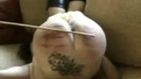 Spanking and Caning Couple