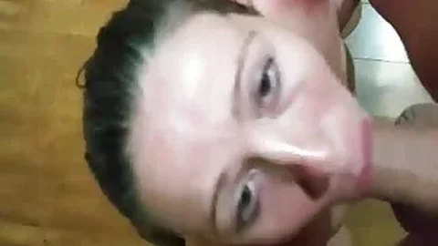 On her knees deepthroating cock