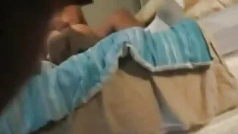 A hot brunette gets warm sperm on her face and tits