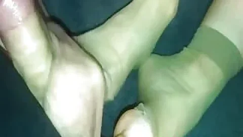 Perverted girl gives footjob until she gets the cum