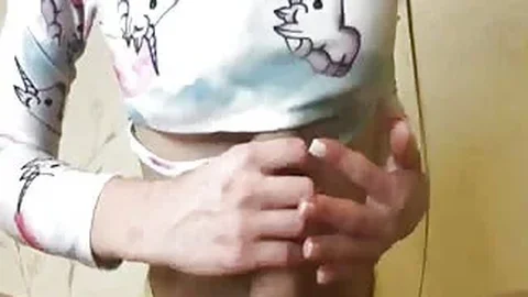 Slim girlfriend with beautiful tits gives an amazing handjob